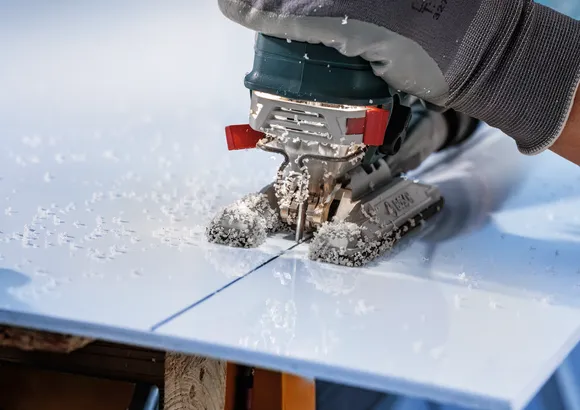 Bosch jigsaw blade cutting laminate sheet.