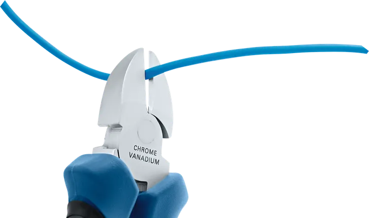 Person grips insulated pliers to cut a blue electrical wire.