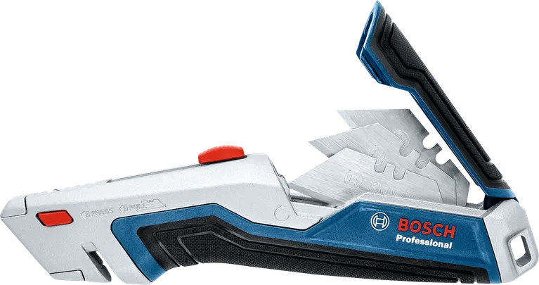 Utility knife with multiple replacement blades visible in a built-in storage compartment.