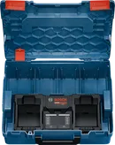 Chargeur de batterie double Bosch 18 V dans un étui de rangement bleu.