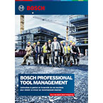 Des travailleurs en tenue de sécurité posent devant un chantier de construction Bosch.