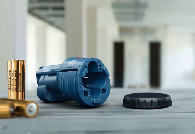 Blauwe batterijhouder met dop.