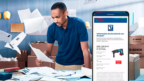 Um homem com uma camisa azul revisa documentos perto de ferramentas e caixas da Bosch.