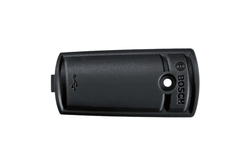 Couvercle de protection pour outils Bosch avec symbole de port USB.