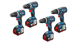 Vier blaue Bosch Professional Akkuschrauber stehen nebeneinander auf weißem Hintergrund.