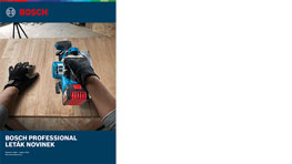 Bosch Professional nářadí na dřevěném stole, ruka s rukavicí, modrá barva.