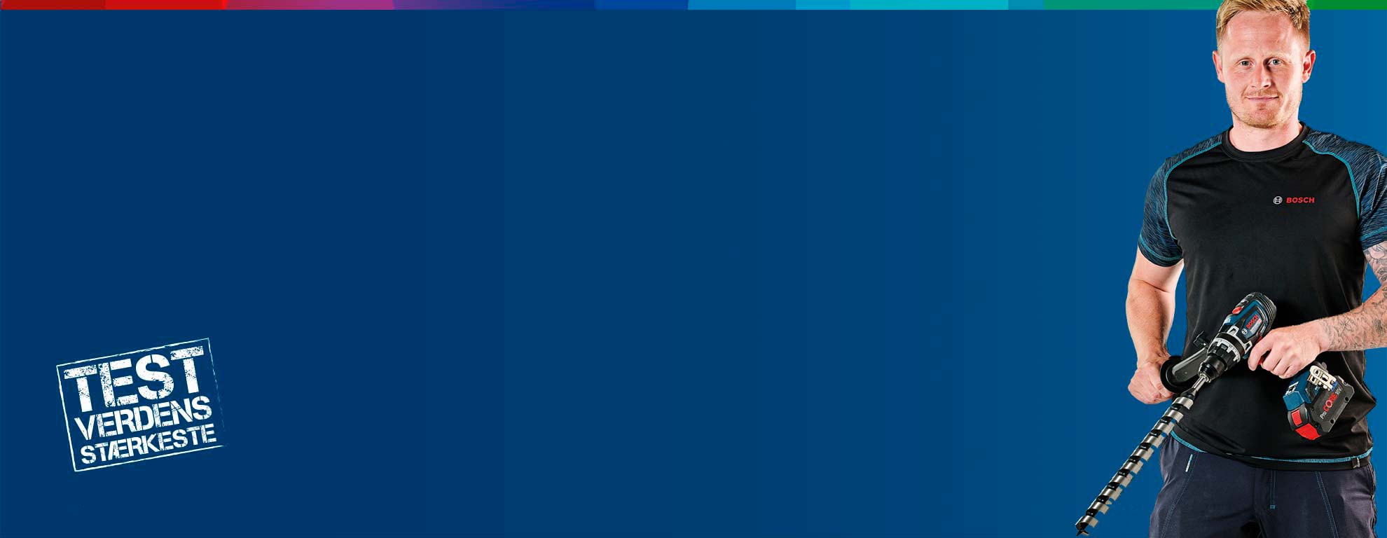 En mand holder en Bosch Professional boremaskine i et blåt miljø.