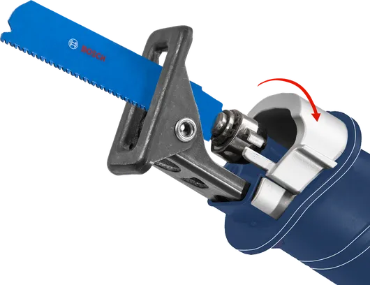 Reciprocating saw blade being inserted into a power tool with a locking mechanism.