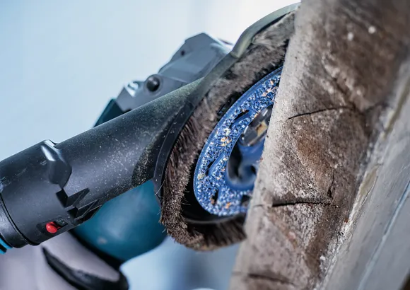 Bosch abrasive brush disc sanding rough wood.