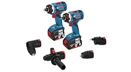 Dos destornilladores Bosch Professional azules con accesorios en una superficie blanca.