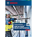 Un ouvrier utilise une perceuse Bosch Professional sur un mur en béton.