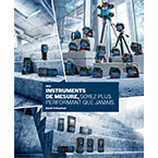 Outils de mesure Bosch Professional sur un sol en béton, disposés en groupe.