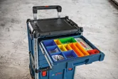 Contractor drawer system with a carrying case open to show organized hardware compartments.