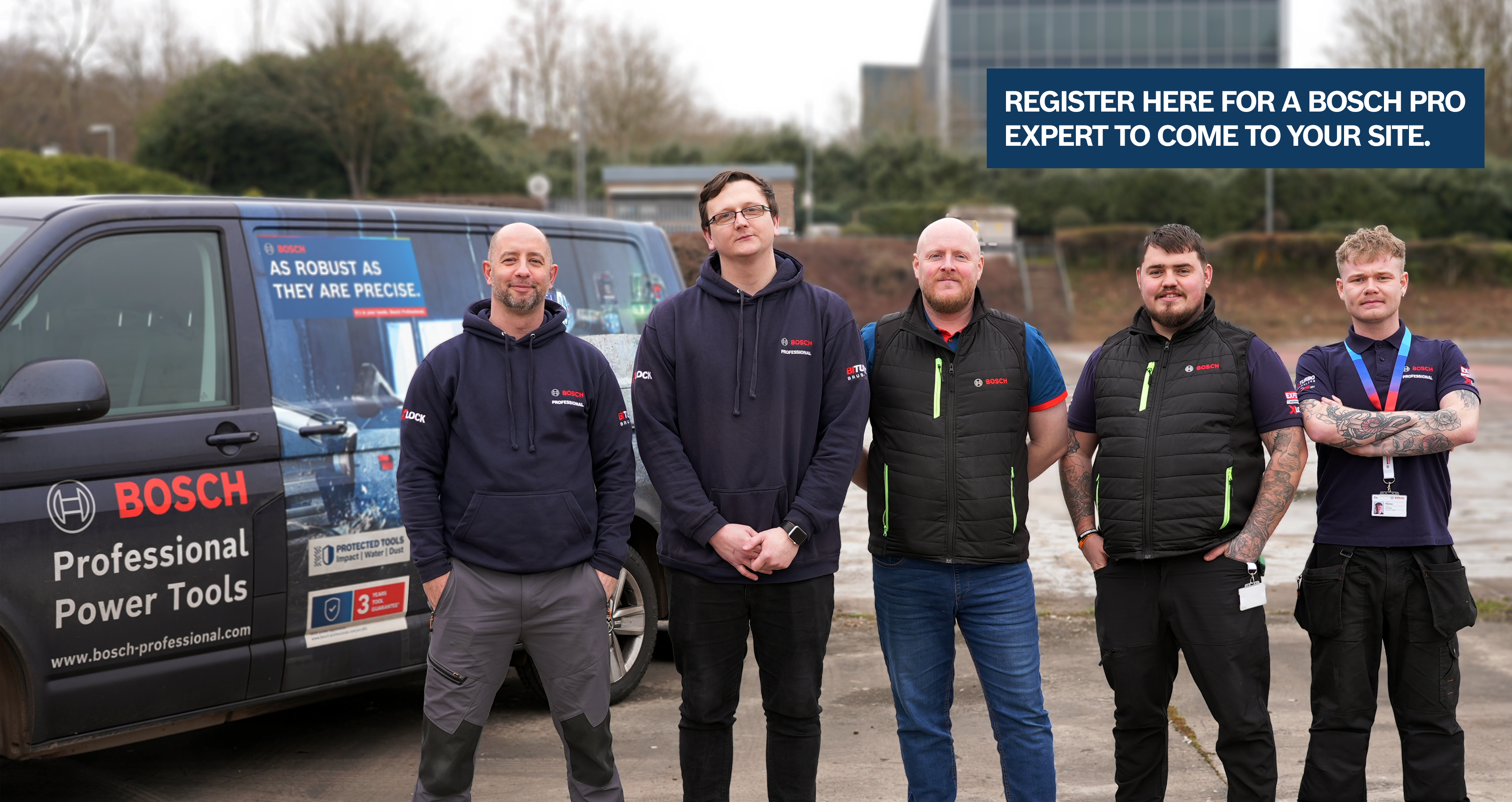 Five men in Bosch Professional attire stand beside a branded van in an outdoor area.