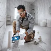 Bosch GOP 185 multitool cutting PVC pipe.