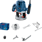 Bosch GOF 130 router with accessories and box.