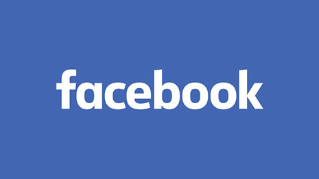 Facebook logo in white on a blue background, representing social media connectivity.