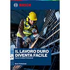 Un operaio con casco giallo utilizza un trapano Bosch su una struttura metallica.