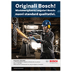 Un uomo in tuta e casco utilizza un utensile Bosch in un ambiente industriale.