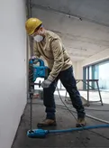 Bosch GBH 6-42 VB rotary hammer drill in use.