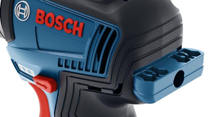 Дрель Bosch с боковым держателем бит.