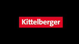 Logo Kittelberger na crnoj pozadini, crven sa belim natpisom.