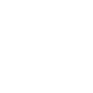 Синий аккумуляторный шуруповерт Bosch Professional лежит на столе.