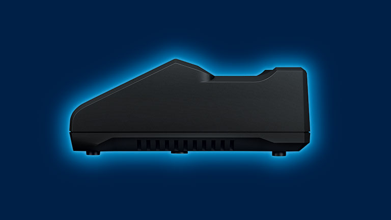 A black Bosch Professional tool lies in front of a blue background.