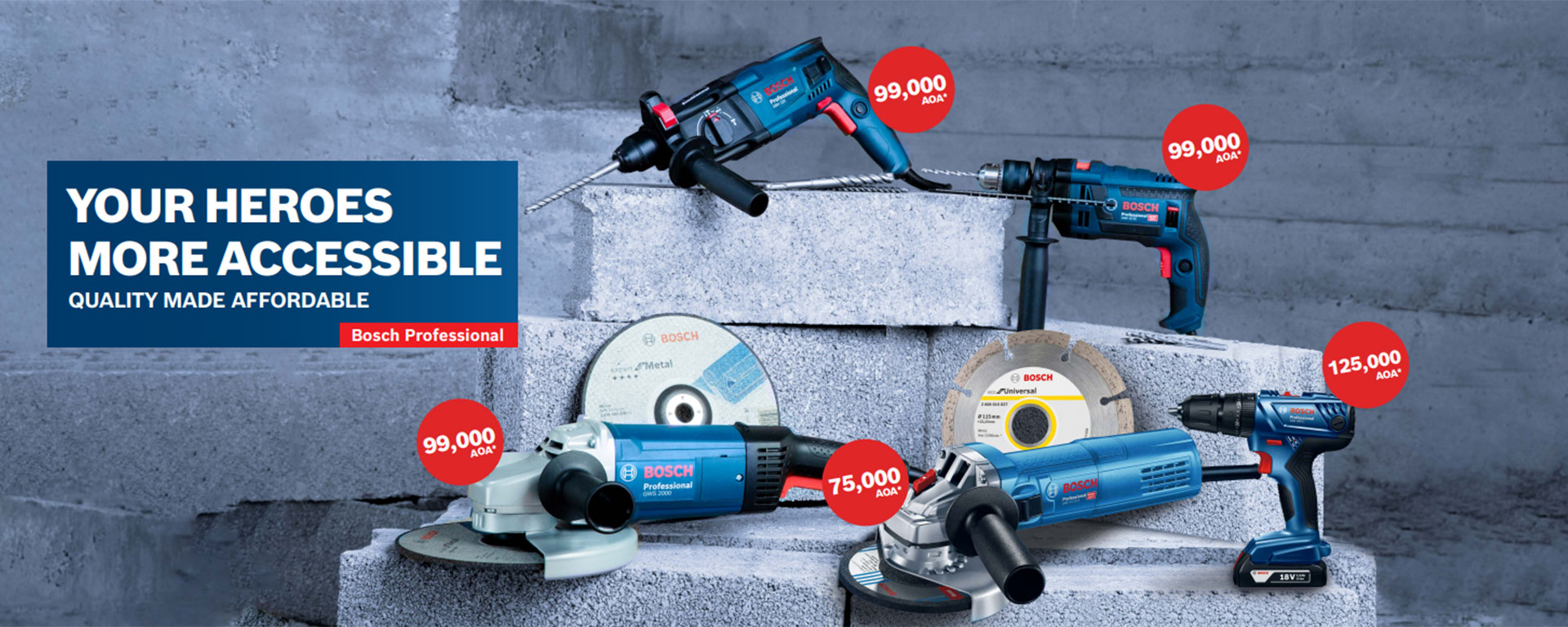 Several Bosch Professional tools arranged on gray masonry.