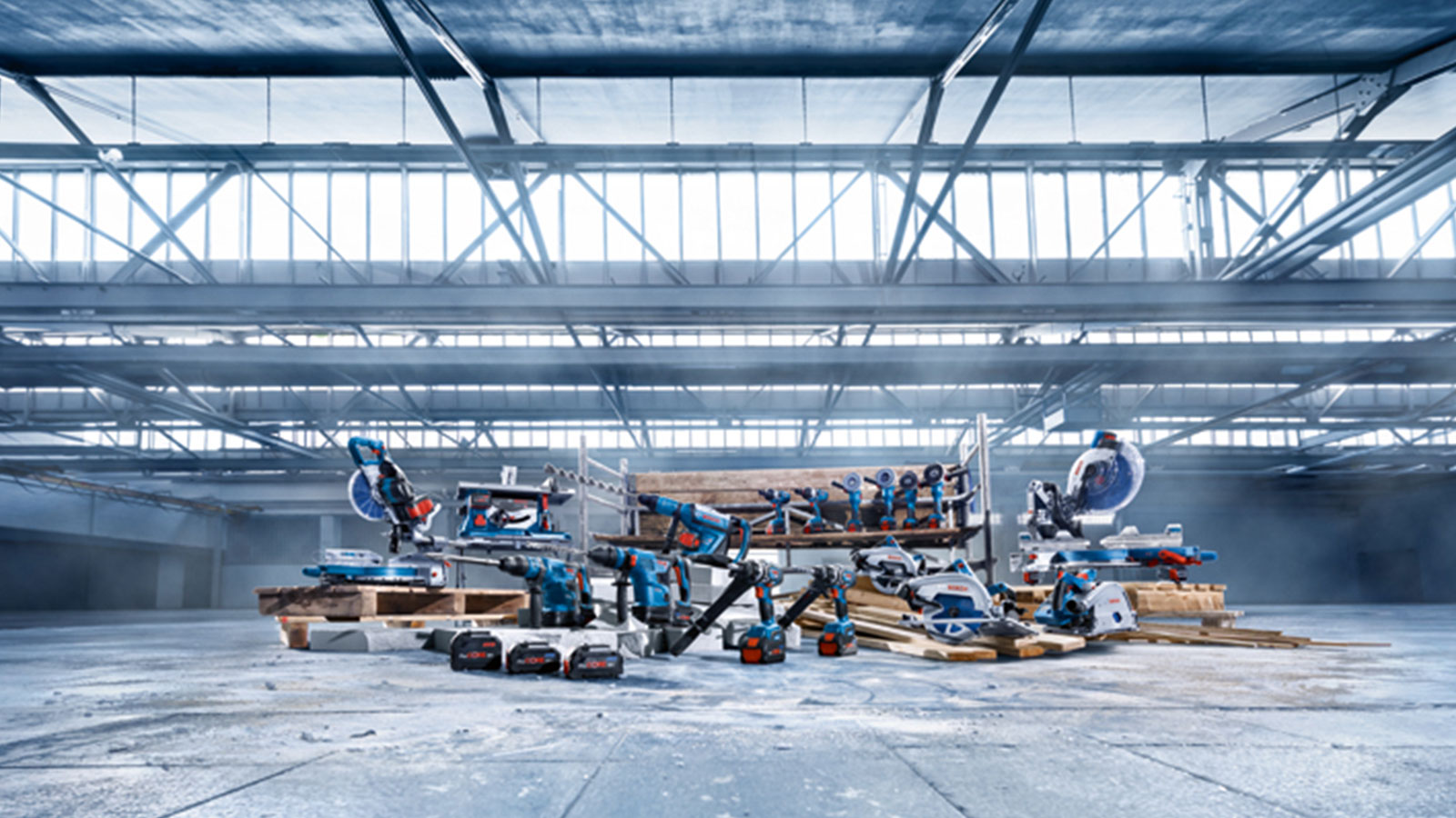 Various Bosch Professional tools in a bright warehouse.