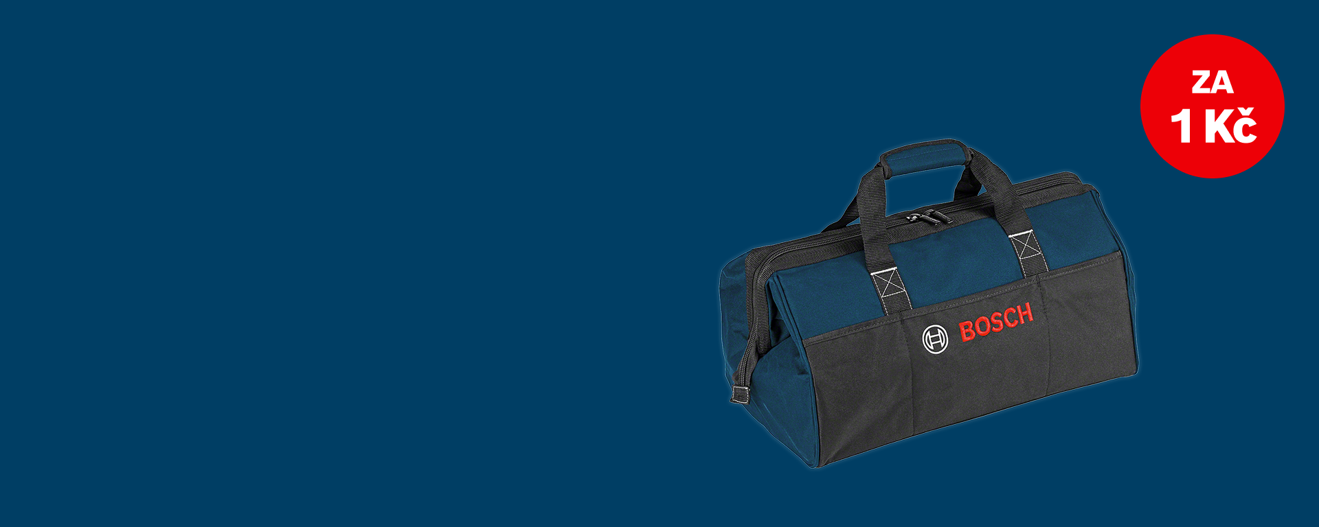 Tmavě modrá taška na nářadí Bosch s černým dnem a červenobílým textem stojí před jednobarevným pozadím.