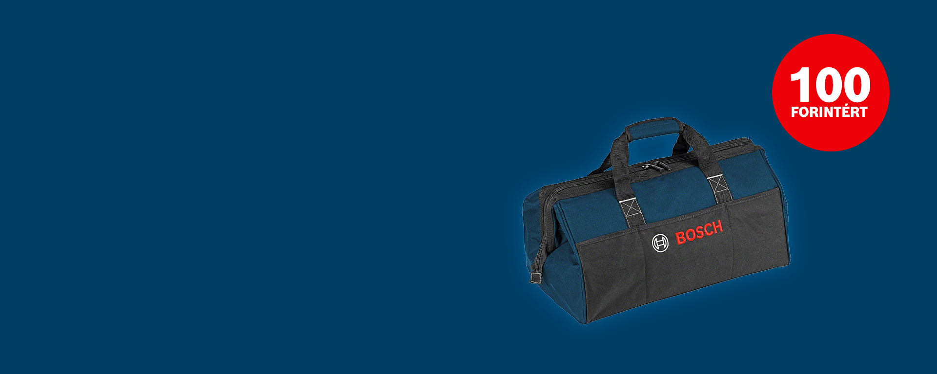 Egy fekete szerszámtáska a Bosch Professional-tól egy kék háttéren fekszik, két fogantyúval.