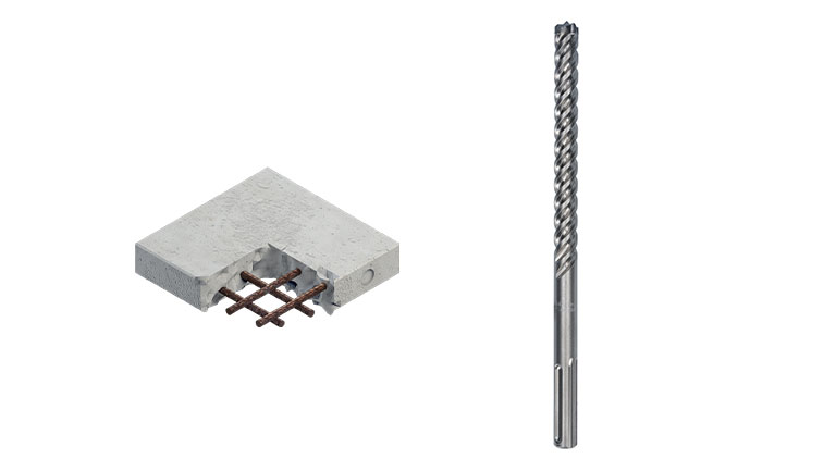 Sivi betonski blok s željeznim šipkama i srebrnom bušilicom.