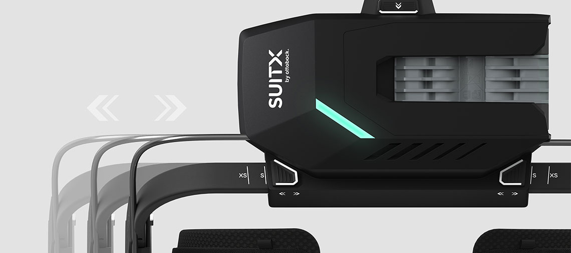 Černý nástrojový doplněk SUITX se zeleným LED displejem na šedém pozadí.