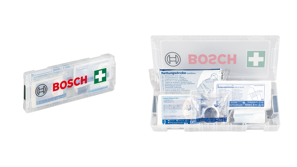 Une trousse de premiers secours transparente Bosch avec divers matériaux de bandage.