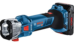 Un tournevis sans fil bleu Bosch Professional est posé sur une table blanche.