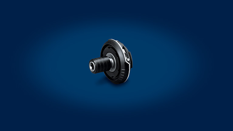 En svart Bosch Professional verktygsdel på blå bakgrund.