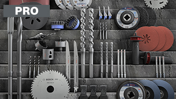 Різні інструменти Bosch Professional на сірій стіні.