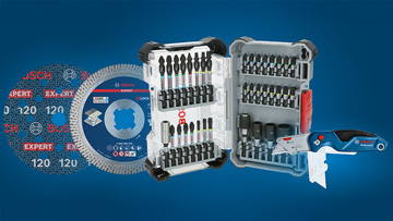 A toolbox with various bits, a saw, and a utility knife on a blue background.