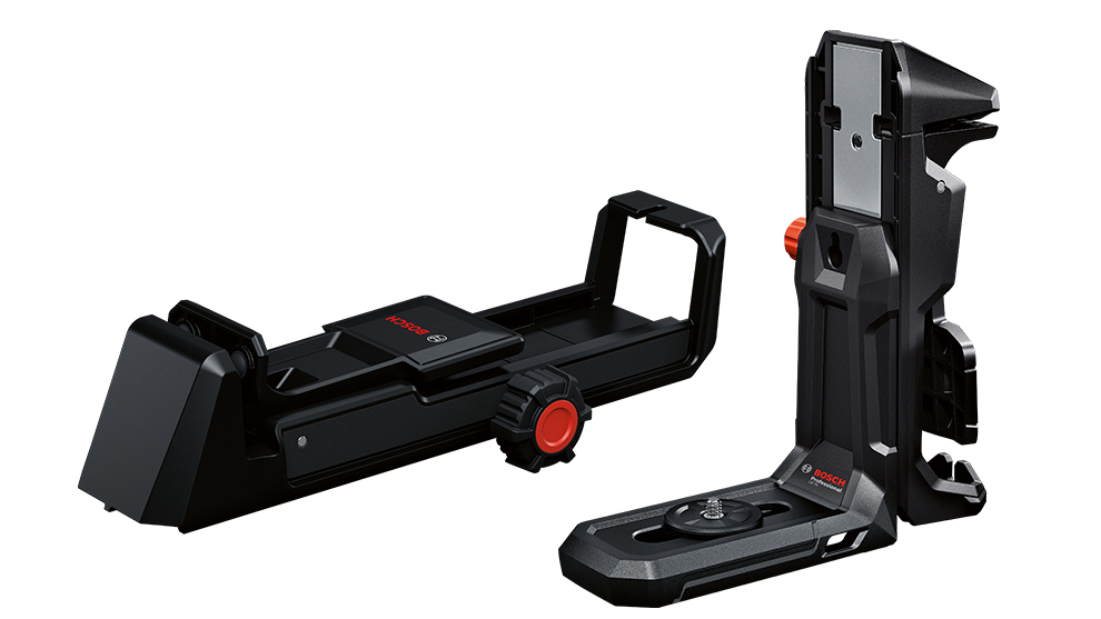 Deux supports d'outils noirs, l'un avec un bouton rouge, l'autre avec une surface striée.