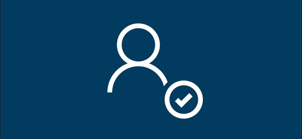 Användarsymbol med bock på mörkblå bakgrund.