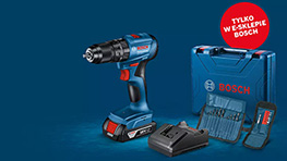 Niebieska wkrętarka akumulatorowa Bosch Professional stoi obok ładowarki.