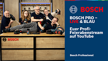 Fünf Personen posieren an einem Tisch mit Werkzeugen, lächeln und halten Geräte von Bosch. Hintergrund ist eine Werkstatt.