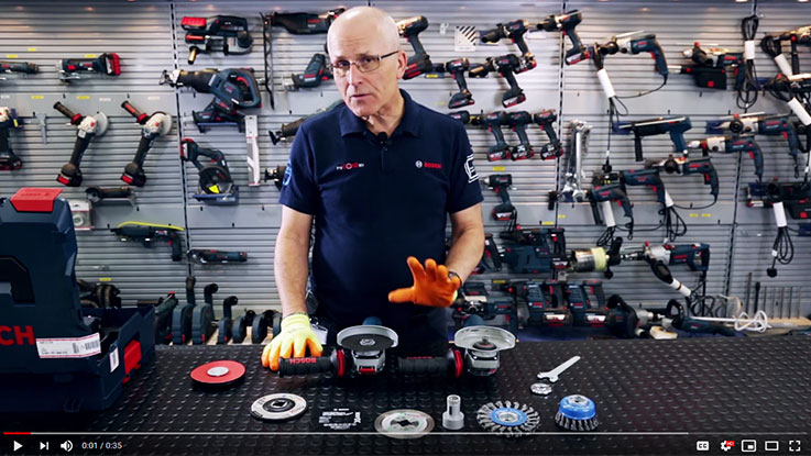 Man explains Bosch Professional tools on a workbench.