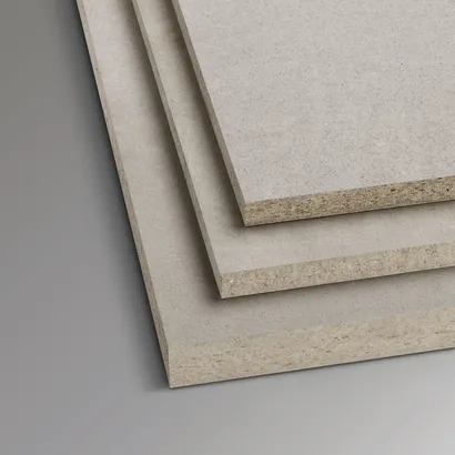 Three stacked fiber cement boards in varying thicknesses.