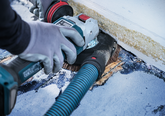 Bosch angle grinder brush head removing floor coating.