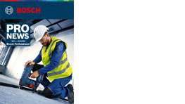 Mężczyzna w żółtej kamizelce pracuje z narzędziem Bosch Professional na podłodze.