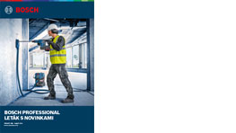 Pracovník v žltej veste vŕta do steny s Bosch náradím, okolie je stavebné.