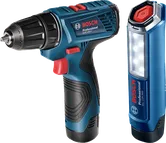 Akumulátorová vŕtačka a pracovné svetlo.