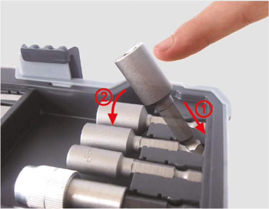 Person removes a hex socket from a tool case using a push and lift motion.
